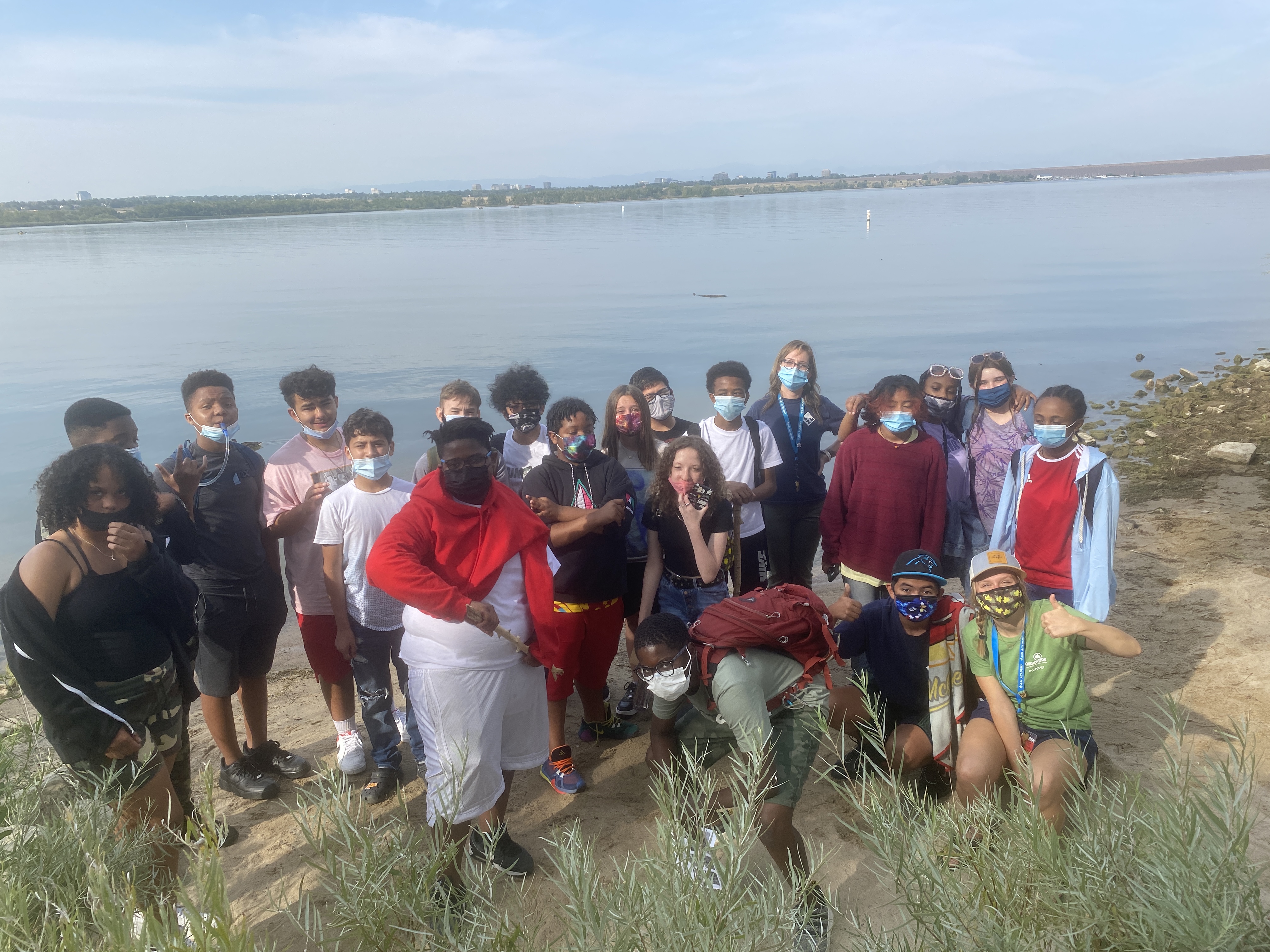Students on the shore of Cherry Creek Reservoir