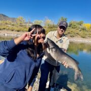 A STRIVE student catching a fish at Lake Lehow!