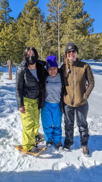 Two Centaurus students and Ms. Jaeger posing at Caribou Ranch