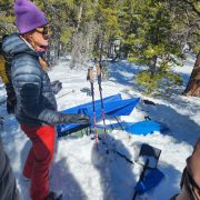 Jessie at LHOC explaining how to build a snow shelter