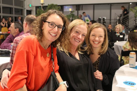 Three women at the Base Camp Bash in 2023