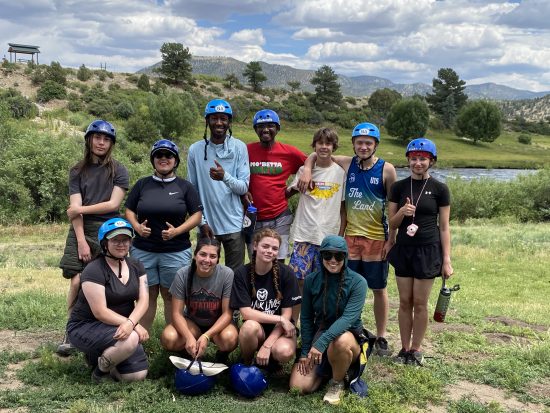 The Lincoln Hills Cares group poses for a photo before going rafting. 