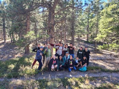 The class posing on the trail as a group