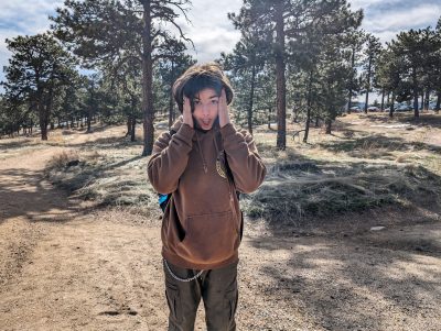 A CAP student participating in activities on the field day at Betasso Preserve