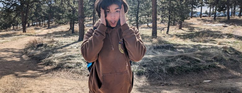 A CAP student participating in activities on the field day at Betasso Preserve