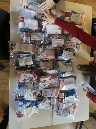 Survival kits built by RiseUp students to donate for people experiencing homelessness