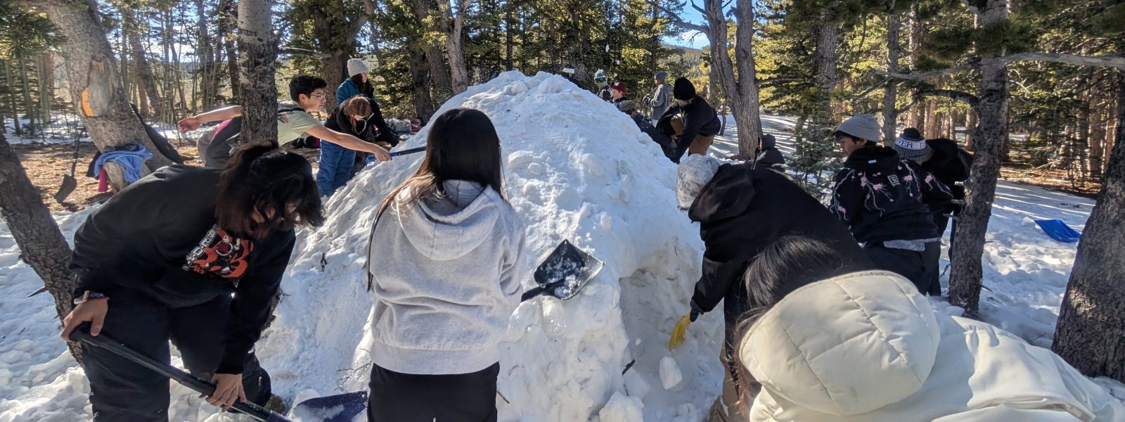 AMS students work on building their quinzee at Brainard Lake.