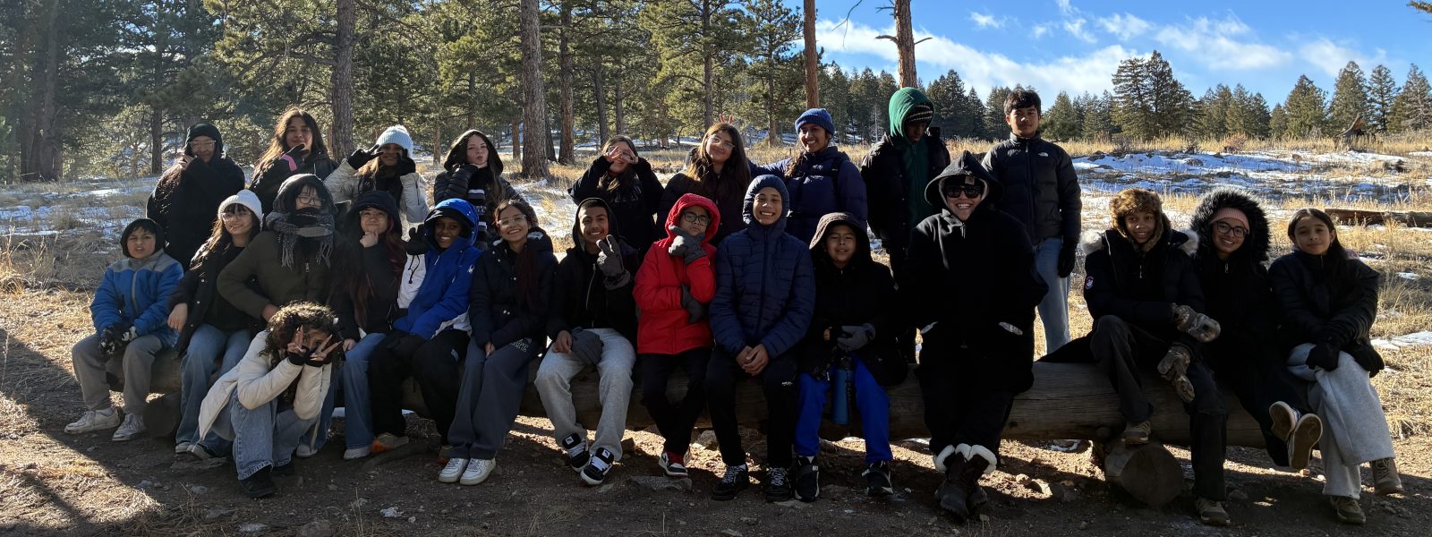 Winter Trimester AXL students pose together for a photo outdoors during their CAP class.