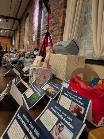 Silent auction items are on display at the Base Camp Bash 2026.