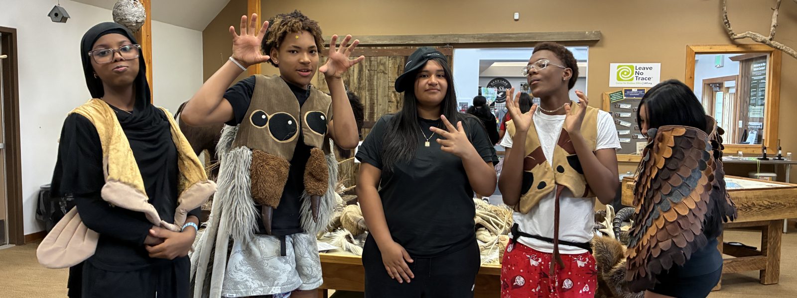 AXL CAP 8th graders make lasting memories as they show off animal costumes they were trying on at Barr Lake State Park.