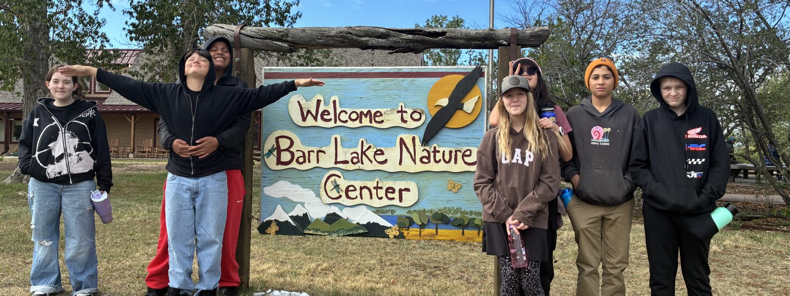 AXL students pose by the Barr Lake State Park sign on their two-day CAP trip.