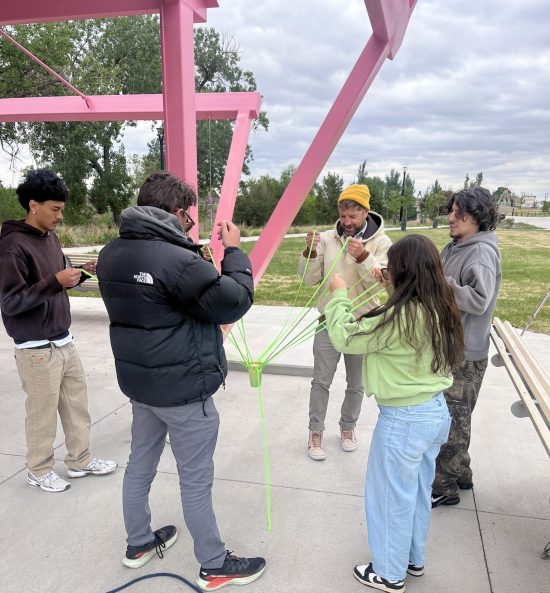 Students participate in a water challenge during their time learning about waterways.