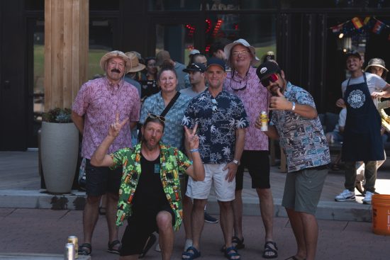 The Trader Joe's team exemplifies the camaraderie of the Throwdown event as they post in their Hawaiian shirts.
