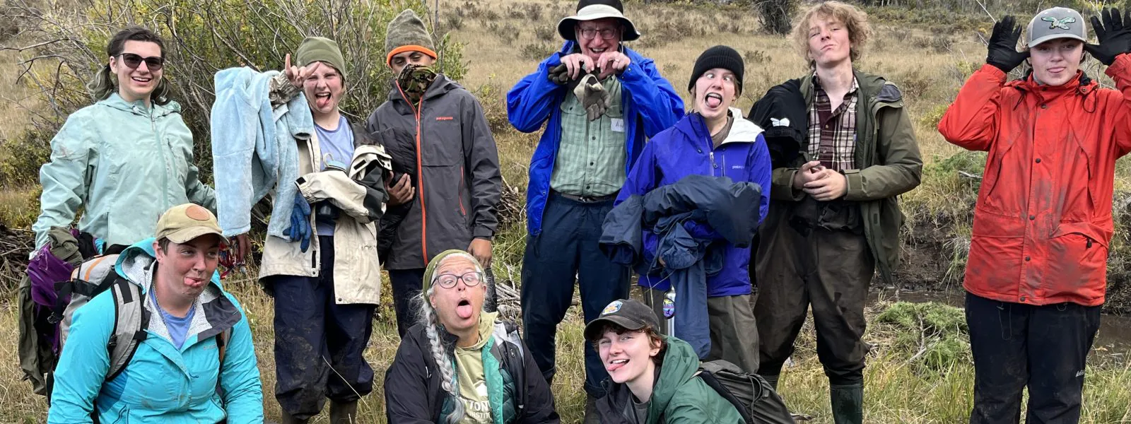 Changemaker students pose for a photo during their weekend working on a Greenback restoration project.